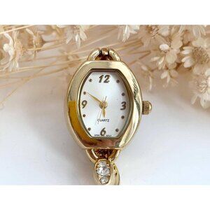 Gold T Oval Bezeled Rhinestone Quartz Vintage Women's Wristwatch - 13mm - WORKS!